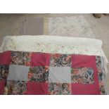 A quilted bed cover applique foliate detail,