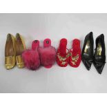 A pair of iconic fluffy pink nylon mule slippers, a pair of red beaded slippers,