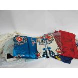 A box containing mainly silk blouses night wear,