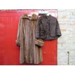 A Brahms of Norwich vintage 1950's mink fur coat with wide turn back cuff and a brown squirrel fur