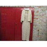 A 60's/70's Harrods cream irredescent and gold sequin halter neck full length evening dress and