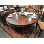 A Victorian rosewood centre table with quatreform base, brass inlay, 71cm tall,