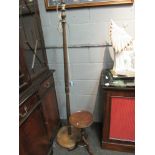 A turned oak standard lamp and a tripod occasional table of small proportions (2)