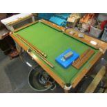 A Linburn snooker table top with two cues, balls and scorer etc.