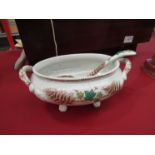 A Meissen style sauce bowl and ladle with leaf and floral design