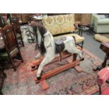 A Horseplay dapple grey painted rocking horse with real horsehair mane, tail and forelock,