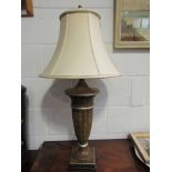 A column form table lamp with cream shade,