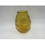 A circa 1960 amber frosted glass vase, three raised fish design,