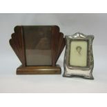An Art Deco picture frame and a silver photograph frame