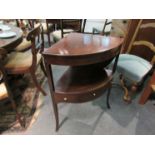 A mahogany three drawer corner washstand with hinged top,