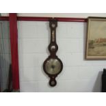 A mid to late 19th Century mahogany five dial wheel barometer