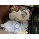 Two boxes containing blue and white Chinese tableware including rice bowls