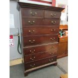 A George III mahogany chest on chest, the dentil moulded top over two short and six long drawers,