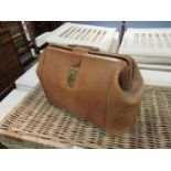 A leather cow hide carry bag "Suffolk England"