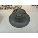 A tall large pewter capstan inkwell,