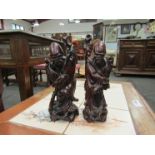 Two carved Chinese figures,