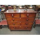 An early Victorian mahogany chest of two short over three long drawers,