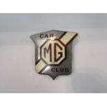 An enamelled MG car club badge