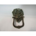 A 19th Century brass lion's mask door knocker,