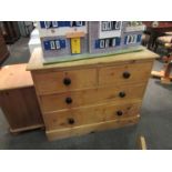 An early 20th Century pine chest of two short over two long drawers on plinth base, 80cm tall,