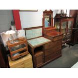 In the manner of "Maple & Co" a late Victorian walnut combination washstand dressing chest,