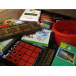 A box containing toys, games and puzzles,