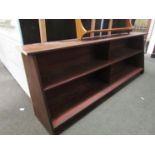 A teak effect freestanding low bookcase, 187.