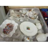 A box containing a quantity of Goss and crested wares including local examples such as Harleston,