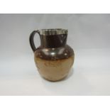 A Royal Doulton harvest jug with silver rim,