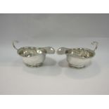 A pair of Walker & Hall silver sauce boats, Birmingham 1934,