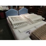 Two single beds and mattresses John Lewis "Anna" cot and toddler bed