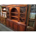 A 20th Century mahogany twin door astragal glazed cabinet,