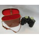 A cased pair of Tohyoh 10x50 fixed binoculars