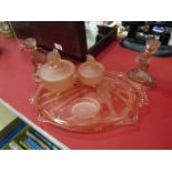 An Art Deco dressing table set by Walther & Sohne, peach pink frosted glass,