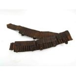 An early 20th Century brown leather bandolier,