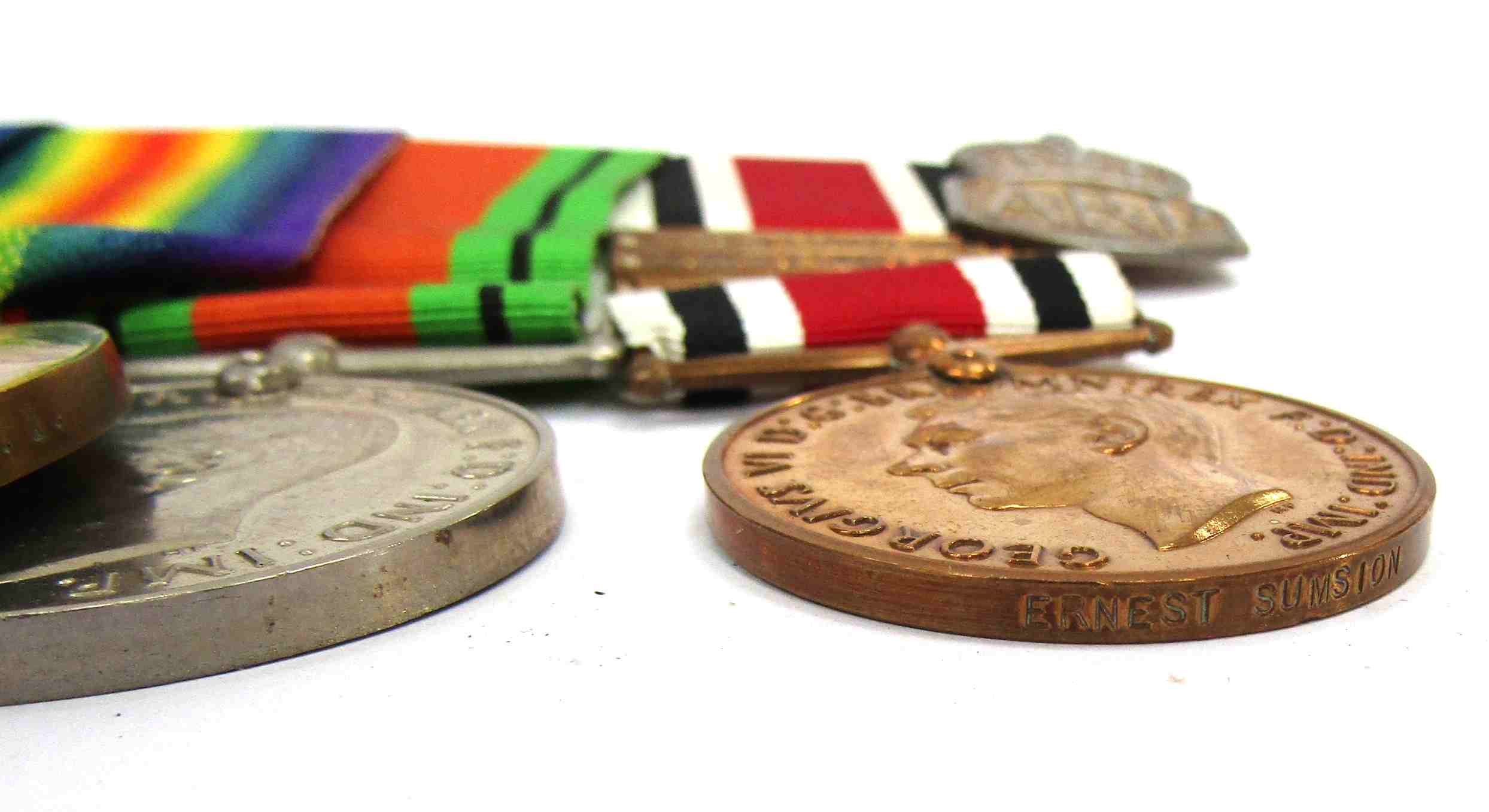 A WWI and WWII medal group of four consisting of War and Victory medals named to 201909 SJT. E. - Image 3 of 3