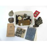 A box containing a collection of Police related badges,