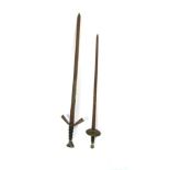 A Victorian or later angled cross-hilted theatrical sword with leather wired grip,