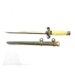 A copy of a German Army dress dagger, no maker's name to blade, cream grip type,