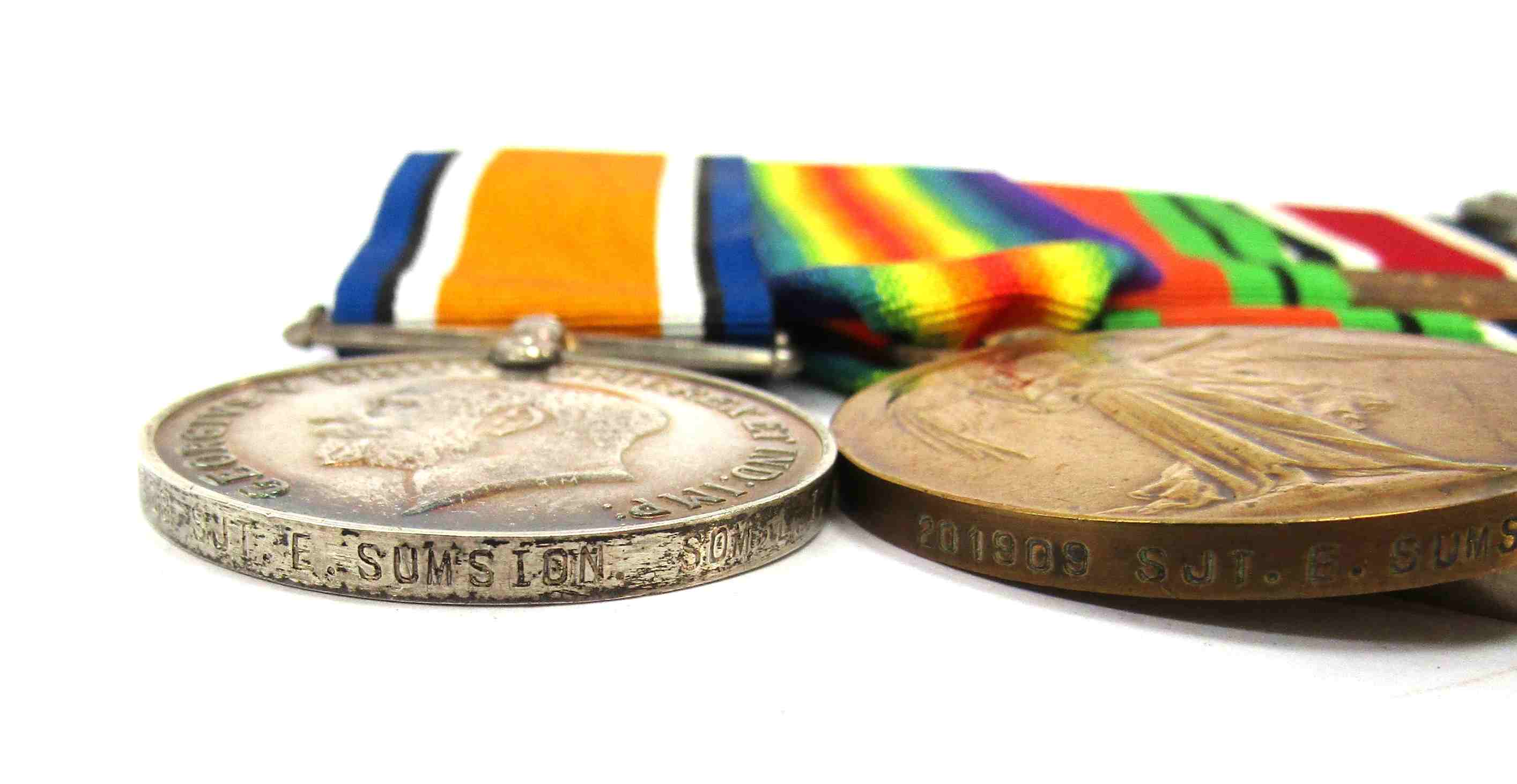 A WWI and WWII medal group of four consisting of War and Victory medals named to 201909 SJT. E. - Image 2 of 3