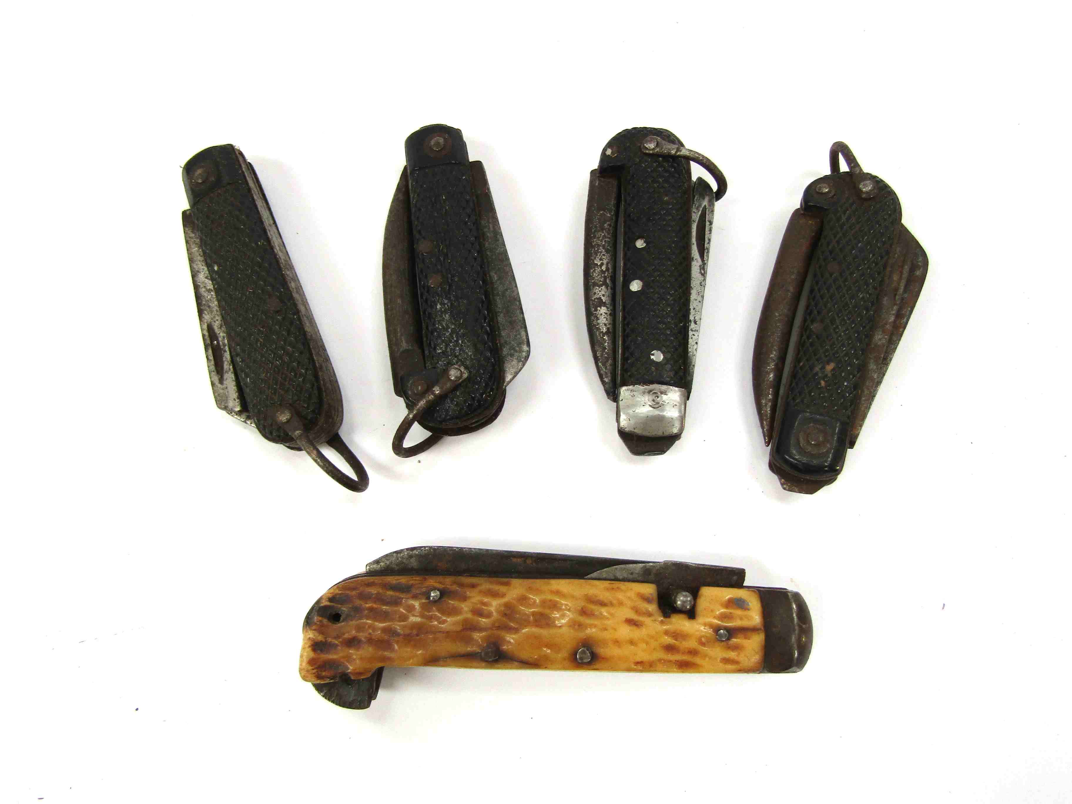 A quantity of British military pocket knives including 1942 dated and antler grips