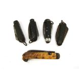 A quantity of British military pocket knives including 1942 dated and antler grips