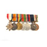 A WWI and later medal group of seven consisting of 1914-15 star trio to J.33223 H.A. HAGG A.H. R.N.