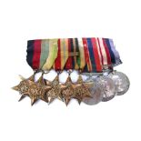 A medal group of eight consisting of 1939-45, Africa, Burma and Italy stars, war medal,