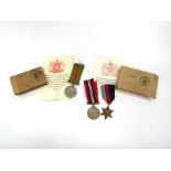 A WWII Defence Medal with box of issue named to MR. A.E.J.