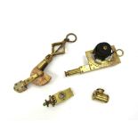 A small quantity of brass devices including Palmer folding brass clinometer (4)