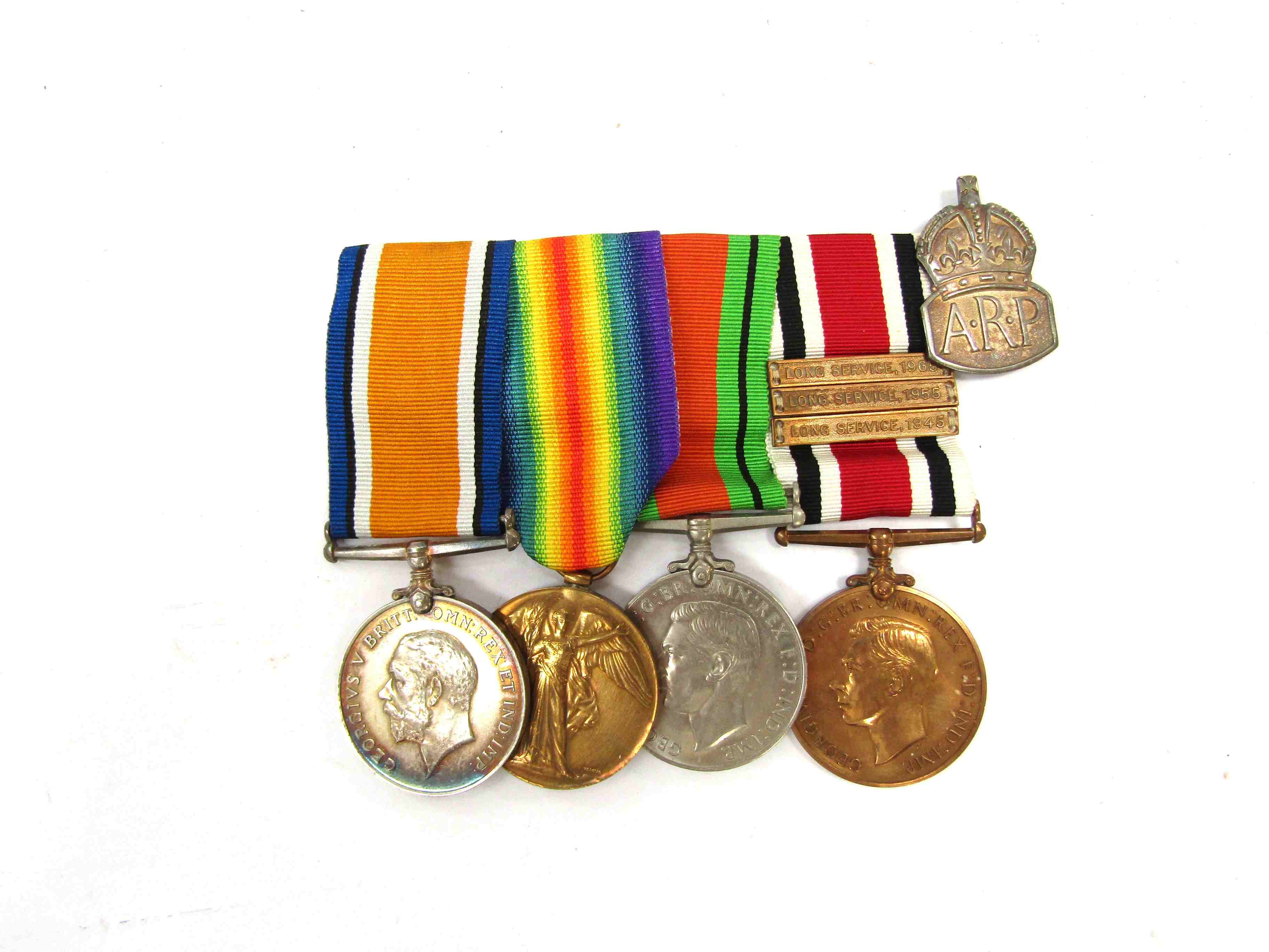 A WWI and WWII medal group of four consisting of War and Victory medals named to 201909 SJT. E.