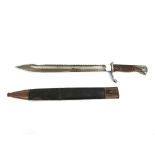 A German 98/05 sawback "Butcher" bayonet, dated W12 to blade back,