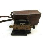 A WWI Vickers clinometer sight Mark III I dated 1918 with matching leather case