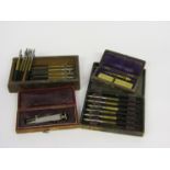 Two cases of watchmaker's jewel setting tools,